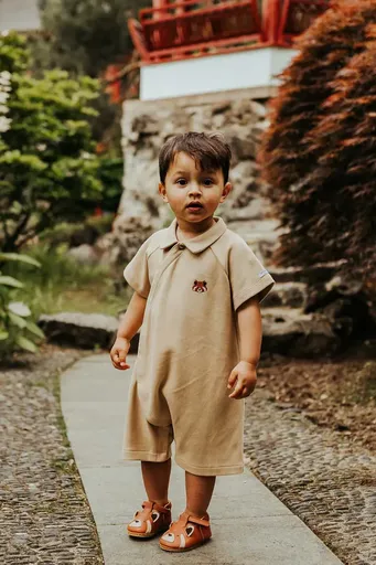 Dětské bavlněné dupačky Donsje Adriaen Playsuit Red Panda