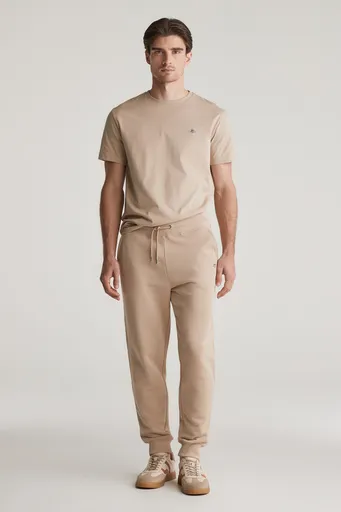TEPLÁKY GANT REG SHIELD SWEATPANTS DRY SAND