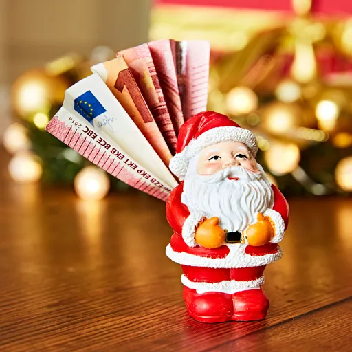 Poslíček s penězi Santa Claus