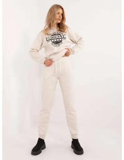 Dámské tepláky s vycpávkami světle béžové