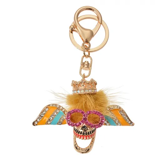 Zlatý kovový přívěšek na klíče s kamínky lebka - 5*2*7 cm JZKC0184