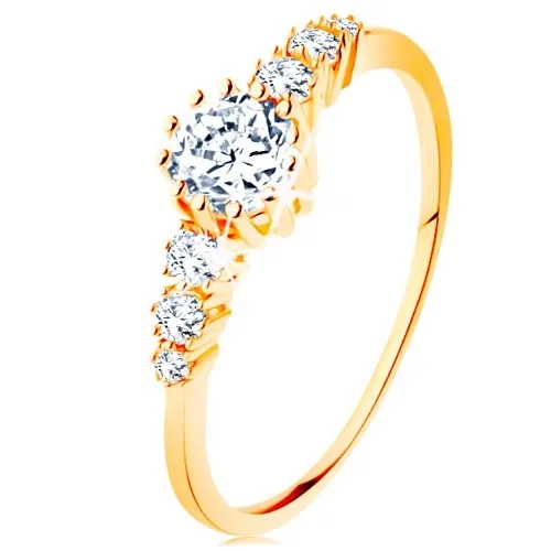 Zlatý prsten 585 - čirý kulatý zirkon, trojice menších zirkonků po stranách - Velikost: 49
