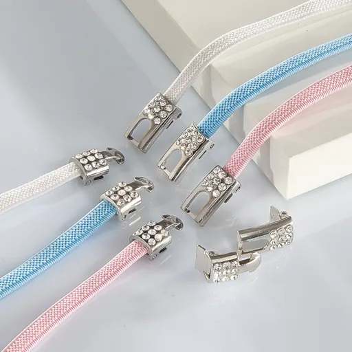 3 páry elastických tkaniček se sponou