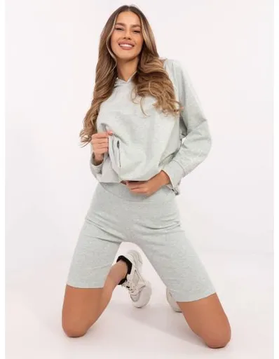 Světle zelená melanžová souprava s pruhovanými legínami