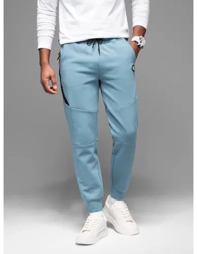 Pánské tepláky s žebrovanými manžetami a ozdobným zipem - světle modré V4 OM-PASK-0226