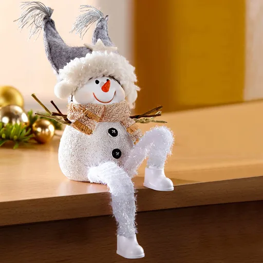 Die moderne Hausfrau Sedící figurka Sněhulák Evald