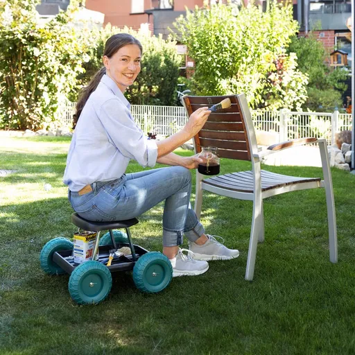 Die moderne Hausfrau Pojízdné sedátko