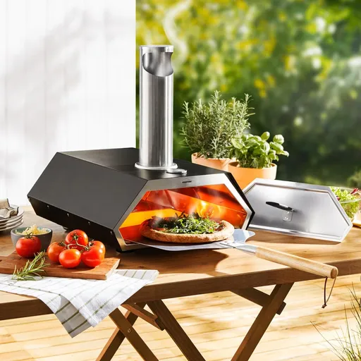 Die moderne Hausfrau Pec na pizzu