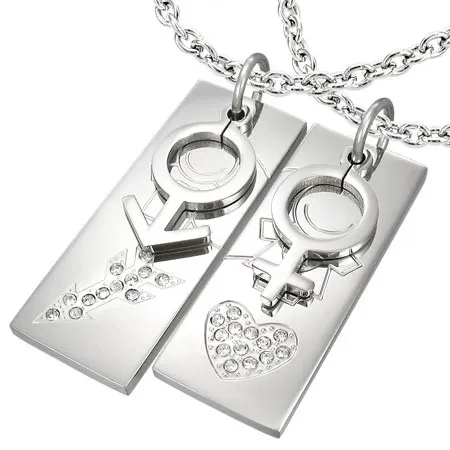 Přívěsky z chirurgické oceli rozpůlené na polovinu srdce a šíp se zirkony