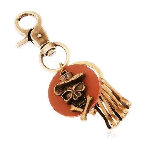 Přívěsek na klíče v mosazném odstínu, hnědý kruh, lebka v klobouku