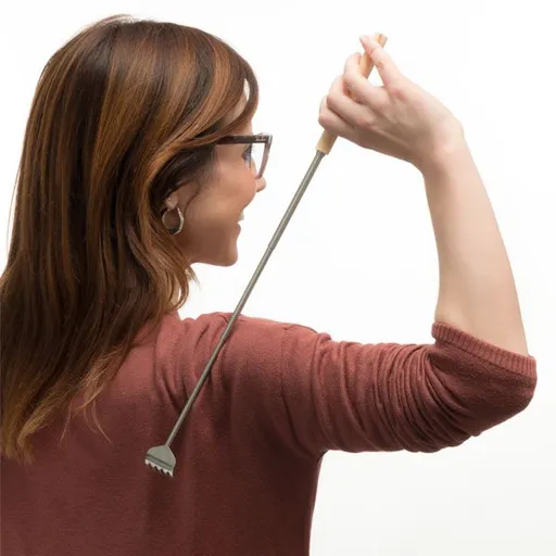 Teleskopické drbátko na záda