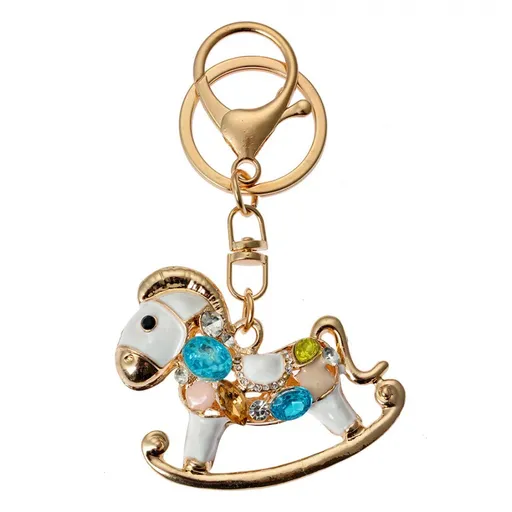 Zlatý kovový přívěšek na klíče s kamínky houpací koník - 6*2*4 cm Clayre & Eef