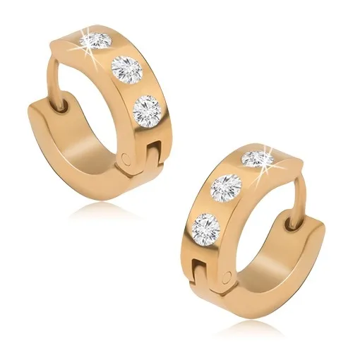 Kruhové ocelové náušnice zlaté barvy, tři kulaté čiré kamínky