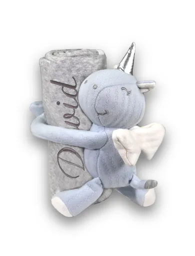 Jednorožec s dekou s výšivkou