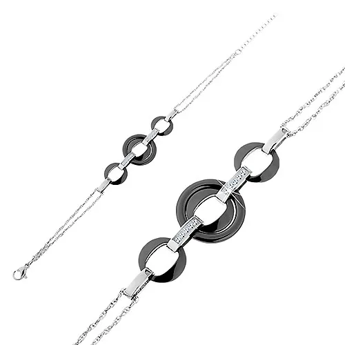 Náramek z chirurgické oceli a z keramiky, kruhy černé barvy, ovály se zirkony